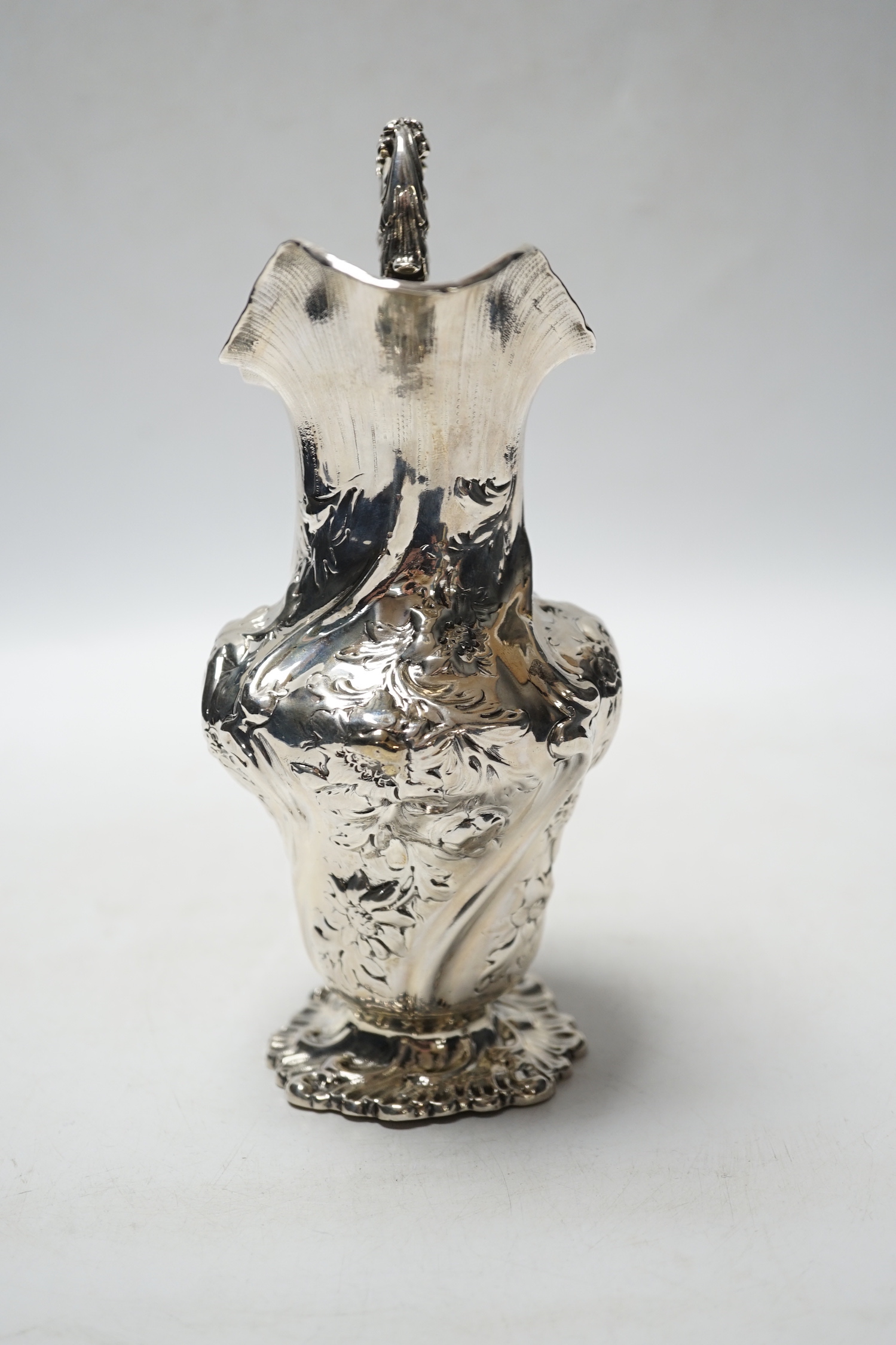 An ornate early Victorian silver cream jug, Charles Fox, London, 1838, 20.7cm, 9.8oz.